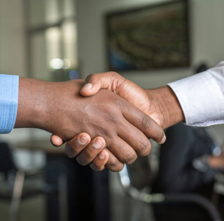 two people shaking hands
